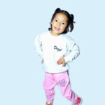 Polera y buzo osita huellas rosa